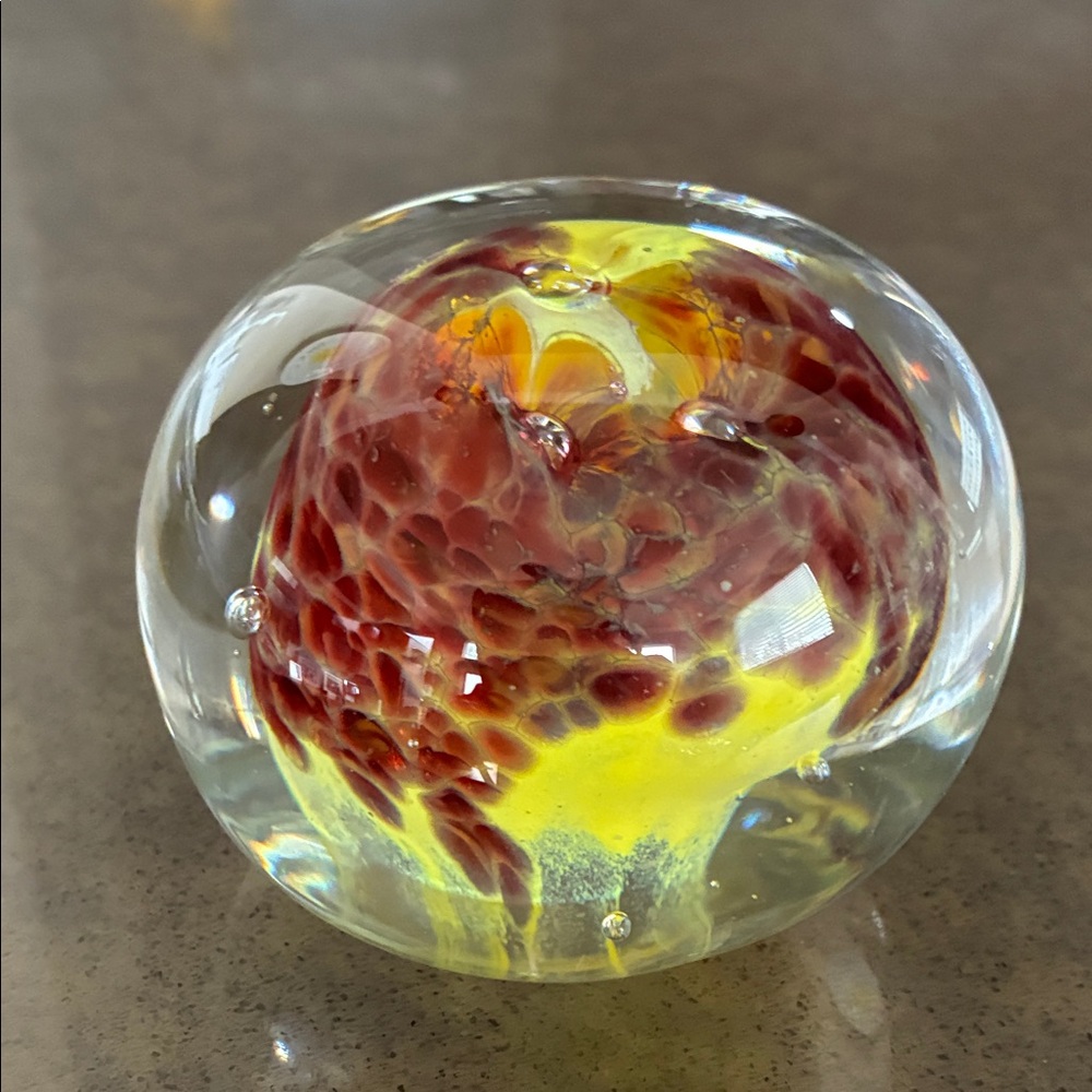 Artistic hand blown Glass Paperweight with Red and Yellow Swirls